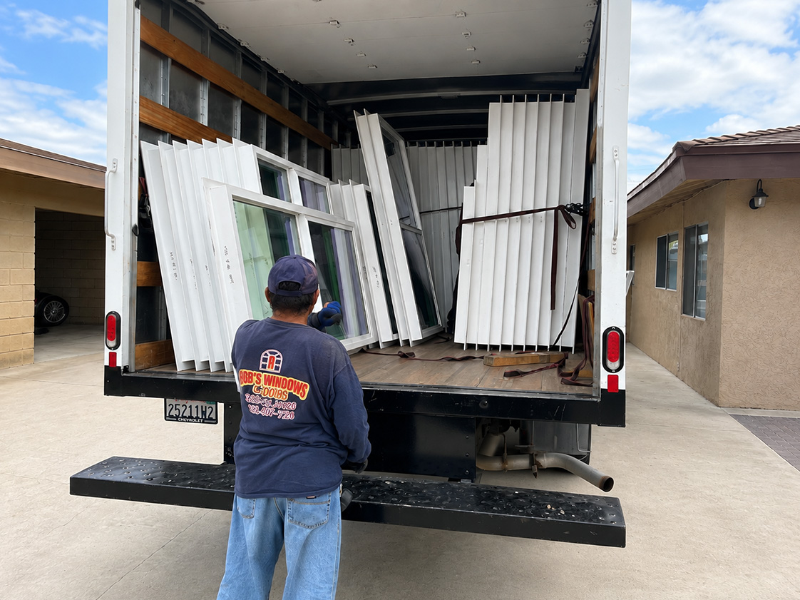 Roger’s Windows team working with custom window and glass materials